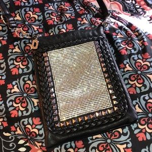 Small jeweled crossbody bag.